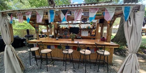Turn Your Backyard Into a Tropical Retreat With a Custom Tiki Bar